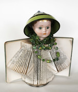 doll with green hat 